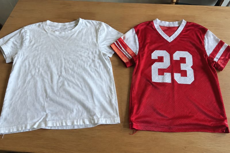 difference between a jersey and a T-shirt shown side by side on a table
